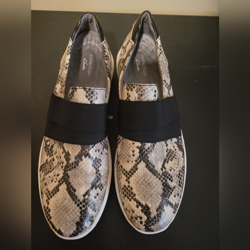Clarks size 10 snake print slip on casual tennis shoes